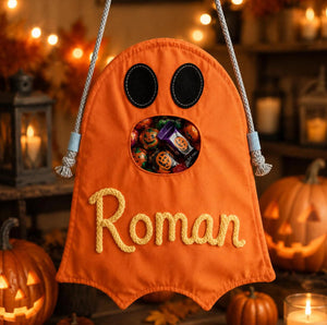 Customizable children's Halloween treat bag with blank or personalized name option for festive collection.