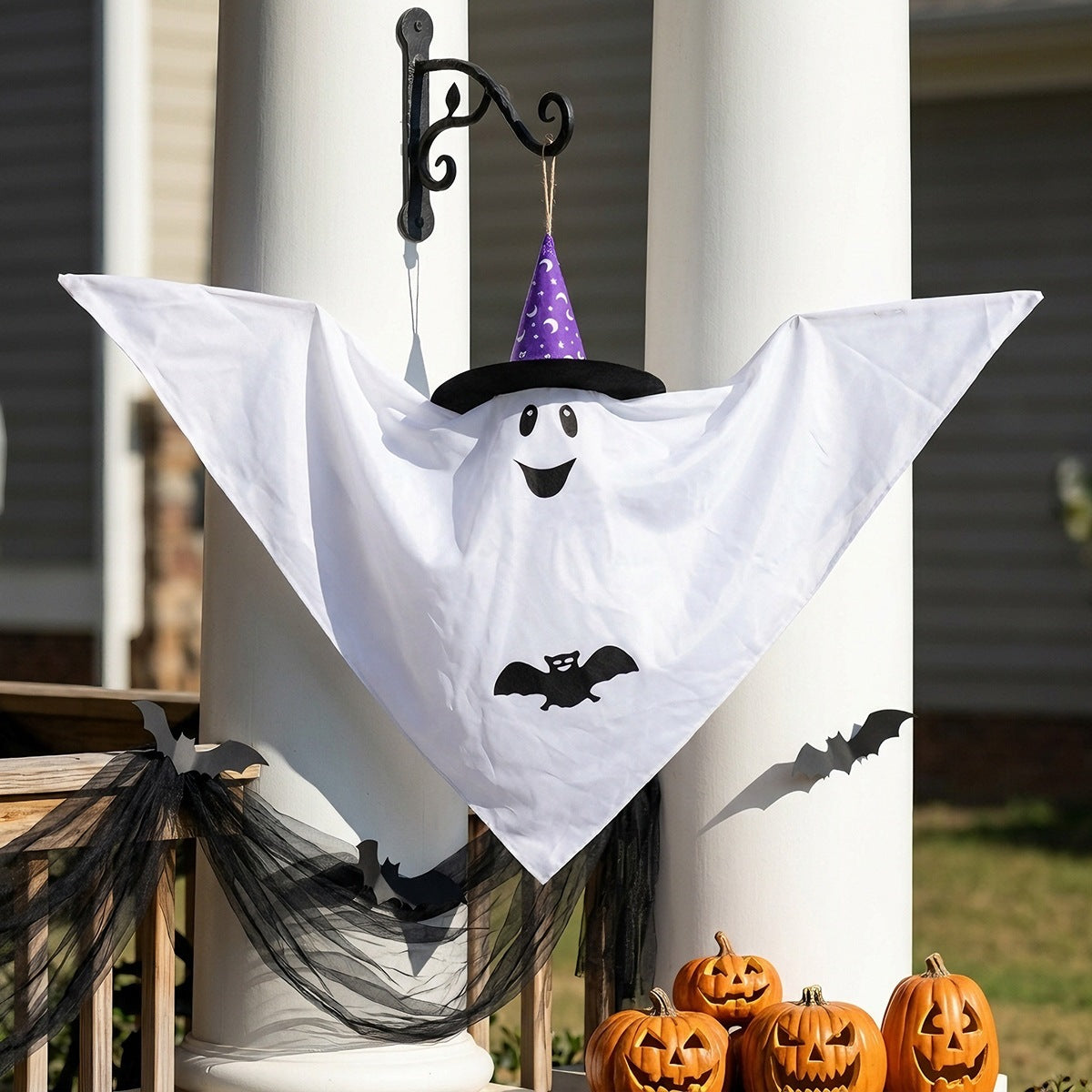 White Halloween hanging ghost with a witch hat for porch or yard decor
