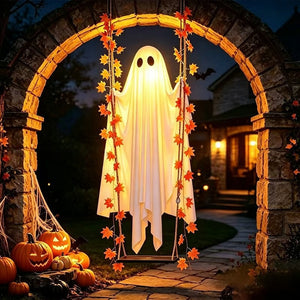 Large glowing ghost swing ornament swaying in the breeze – ideal for Halloween outdoor parties and porches.