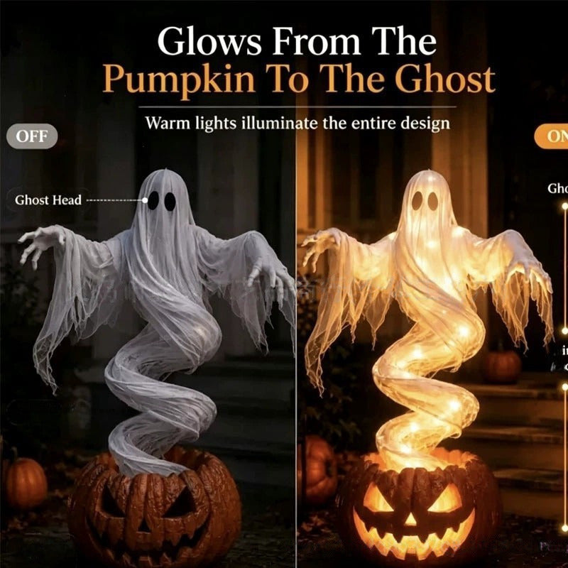 Layered gauzy fabric Halloween ghost pumpkin yard light with floating ghost face and warm glow.