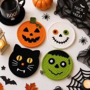 Colorful knitted coaster set featuring playful Halloween characters – ideal for gifting and seasonal home use.